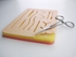 Picture of SUTURE TRAINING PAD WITH WOUNDS WITH MESH, 1 pc.